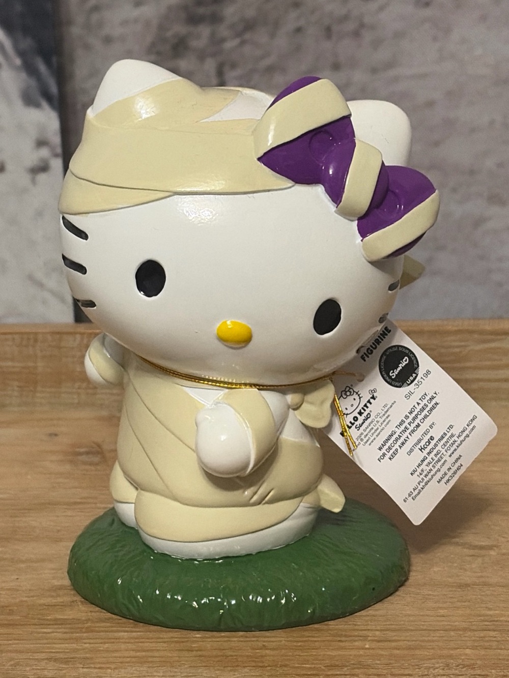 Hello Kitty Cream Mummy Figurine with Purple Bow 6in